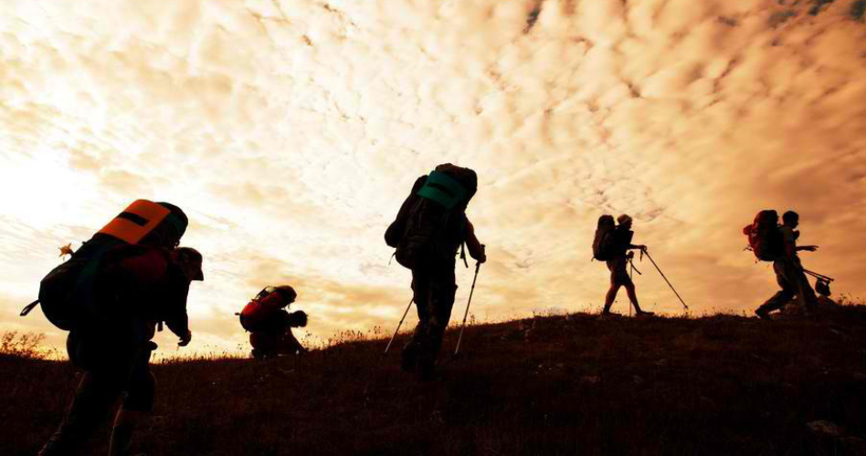 image of a group of trekkers depicting difficulty in business transformation